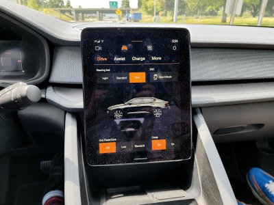 The touchscreen reminded me of a giant tablet.  The driving settings screen is displayed here.  There are three settings for steering, you could turn sport mode on and off, set regenerative braking to off, low, or standard, and enable or disable creep mode.  This is also where you interacted with Google Assistant and messed with all of the other doodads in the car, as well as set climate control.  Also, for what it's worth, that space beneath the tablet is a wireless charging pad for a phone.