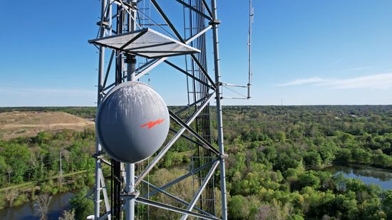 Device on an antenna, covered in bird poop.