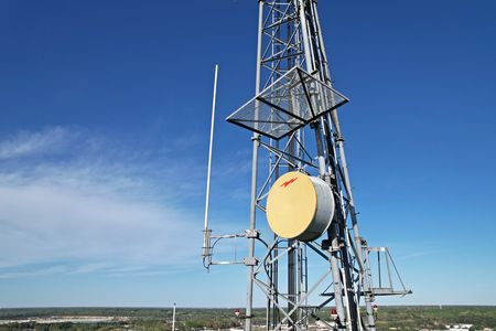 Another device on the same antenna, also covered in poop.