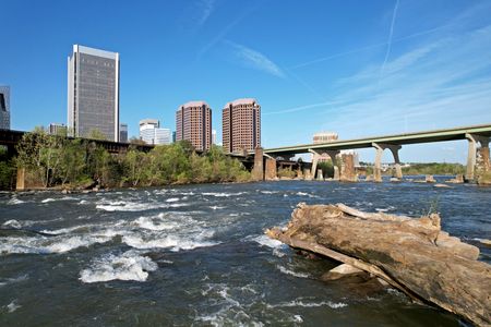 Skimming over the river at a low altitude.