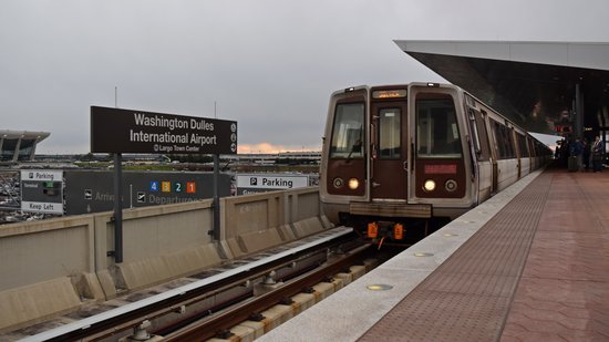 A Largo-bound train arrives at Dulles Airport station.  Getting this shot, I couldn't help but think, "This is what we've been waiting for all of these years!"