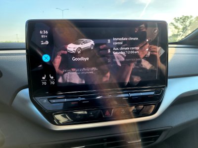 Center touchscreen between the two front seats.  Climate control was accessed using real buttons underneath the screen.