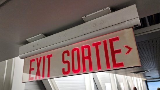Nothing says "Welcome to Canada" quite like a bilingual exit sign.