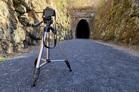 My DSLR is set up to photograph the tunnel portal.  Note that the legs of the tripod are not extended.  I often find myself using the tripod at its shortest when I'm doing tunnels and such, because I like the lower angle, which makes it look less like I'm just standing and photographing everything at eye level.