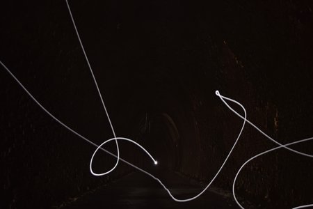 This was an accidental shot that I decided not to wait for.  It was a long exposure image where I had accidentally started the exposure with the remote, but then after a couple of seconds, I picked up the tripod and started walking.  That led to the east portal's leaving a streak on the image as I carried it along.