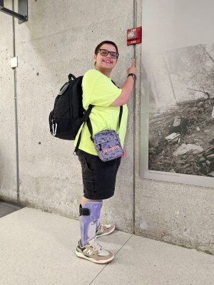 Elyse points to a relatively low-mounted fire alarm strobe along the way to the main terminal from the Metro.  Elyse isn't all that tall, so having something at her height like that amuses us both.