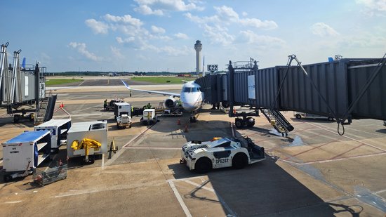 Our chariot awaits, at gate C22.  This was N88327, an Embraer ERJ 170-200 LR operated by Mesa Airlines as United Express flight 6169.