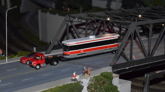 A CLRV streetcar, numbered 4019, being hauled away on a flatbed truck for scrapping.