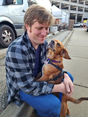 Chris holds Juni, a dog that he and Sis adopted a few months ago.  It made me so happy seeing them interact with Juni, because you could totally feel the love between all of them.