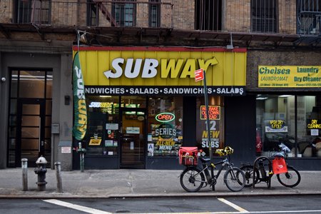 Subway storefront along West 26th Street.  I look at this photo, and I can't help but think that this looks so stereotypically New York.
