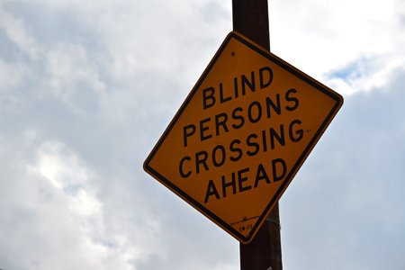 "Blind persons crossing ahead" sign on 7th Avenue between 23rd and 24th Street.