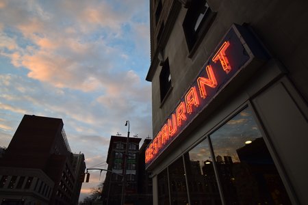 Various shots of the sign on the restaurant's south facade, focusing on the sign.