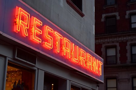 Close-up of the sign on the Broadway facade.