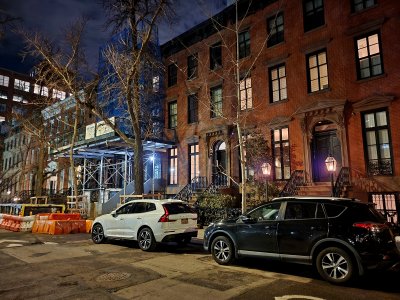 10 St. Luke's Place, viewed from across the street.  When I went by in 2015, the house to the right was under construction.  Now, the house to the left was under construction.  Figures.