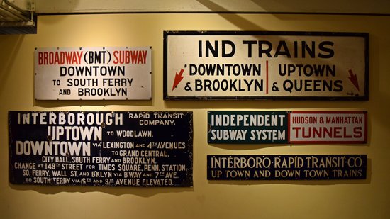 Display of various signage used in the subway system over the years.