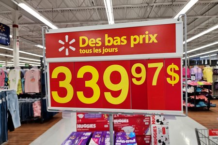 Price sign at the Walmart in Gatineau.  Like in Toronto, the signage is red, but the words at the top of the sign are in French.  Like everything in Quebec, the signage inside the Walmart was all in French.  Also note that the dollar sign was at the end of the price rather than at the beginning.