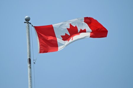 A Canadian flag, flying outside Parliament in Ottawa.  This was my first time photographing the Canadian flag.