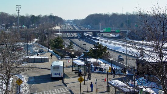 A view of Vienna station from the north garage, facing approximately east.  I-66 certainly looks different nowadays, following an express lanes project in the late 2010s and early 2020s that widened the road and added toll lanes.