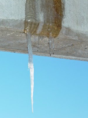 Icicles hanging from the edge of the north garage.