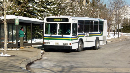 A Gillig Phantom services a stop on the CUE Green 2 route.