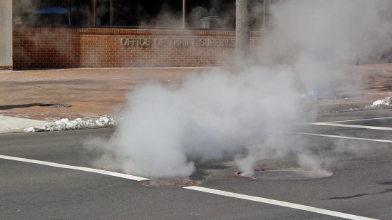 Steam coming up from the street near the intersection of 17th and G Streets NW.