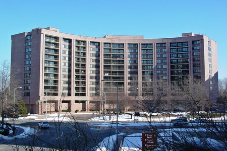 Crystal Place, an apartment building nearby.  This building still uses its original name, likely because, unlike commercial buildings, residential buildings tend to have names.