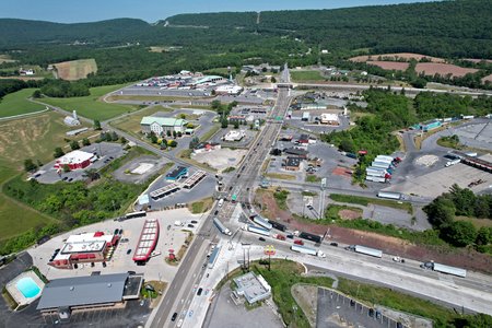 The Breezewood strip.  Westbound traffic on I-70 comes in on the roadway in the lower right of this photo, then makes a right turn to go through Breezewood.  Then they make a right turn onto the Pennsylvania Turnpike ramp near the top of the photo in order to continue on I-70.