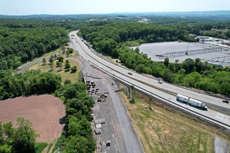 Breezewood interchange.  The road that turns out to the bottom middle is the PTC-owned portion of the abandoned section of the Pennsylvania Turnpike.  The PTC-owned section runs from where it turns out to US 30, where it terminates.