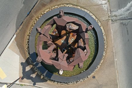 Overhead view of "Joy of Life", showing the faces on the figures.