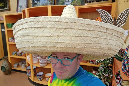 Trying on a giant sombrero in a gift shop.  My exact words when posting this on Facebook were, "I look ridiculous in this, don't I?"