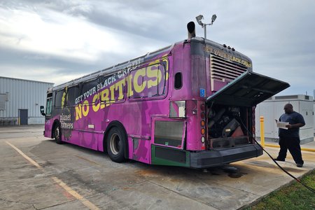 Montigue stands by while the CARTA folks hook our bus up to another bus to give it a jumpstart.