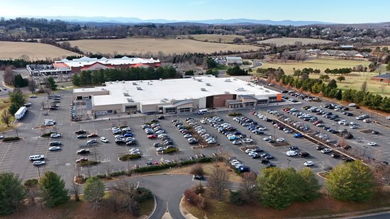 The Walmart in Warrenton, photographed with the new drone.  This is a Supercenter conversion, having been converted during the Project Impact era.  This store used to have a reddish exterior, and always had an open-truss ceiling on the inside.  As such, it is nearly impossible to tell that this store was not originally built as a Supercenter.