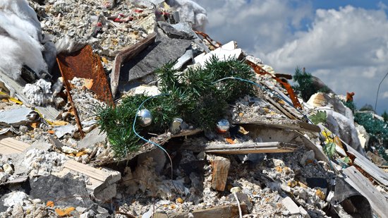 Christmas decor sticking out of the debris pile.