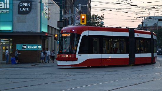 While we were waiting for our next streetcar, we spotted 4420 rounding the corner from eastbound Carlton Street onto southbound Spadina Avenue, running nonrevenue for training purposes.