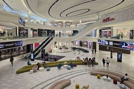 Court containing the guest services counter, viewed from the middle level.