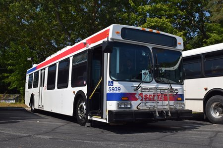 Former SEPTA bus 5939, a 2004 New Flyer D40LF, owned by Junior Mason.  At the end of the event, Elyse and Kyle went out for a spin on this bus.