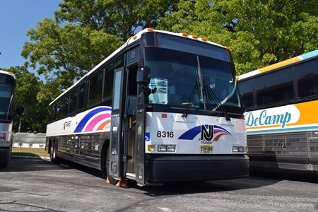 NJ Transit bus 8316, a 2002 MCI D4500, now part of the collection of Friends of the New Jersey Transportation Heritage Center.