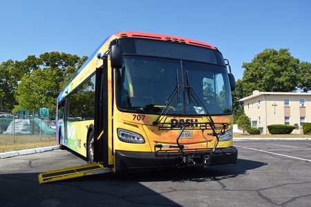 DASH bus 707, a New Flyer Xcelsior, wearing this year's pride wrap.  This bus was DASH's formal participation in the show, and also operates in regular service for DASH.