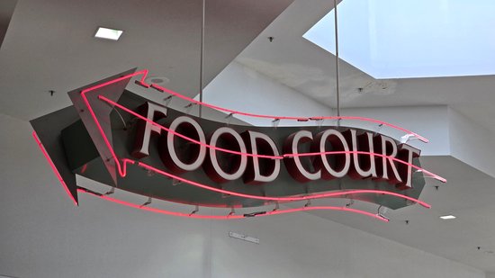 Neon food court sign.