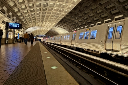 Upper level of Metro Center, with a Glenmont-bound 7000-Series train at the platform.