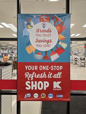 The vestibule had a banner welcoming you to Kmart, positioning the store as the one-stop shop for home cleaning supplies.