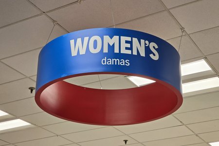 End-stage era signage in the women's clothing area.