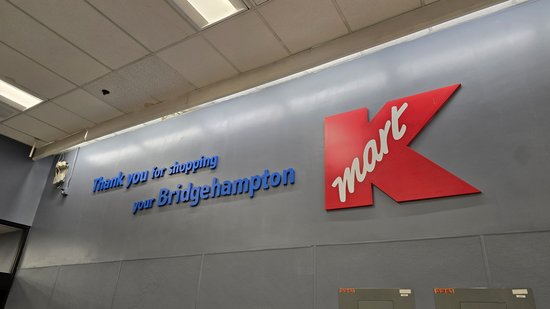 "Thank you for shopping your Bridgehampton Kmart" signage at the exit, using the 1990s-era Kmart logo.