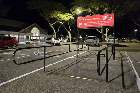 The signage on the cart corrals appeared fairly recent, and was specifically made for Bridgehampton, seeing as the town's name is present.