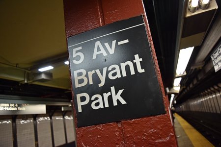Platform signage at 42nd Street-Bryant Park/Fifth Avenue station.