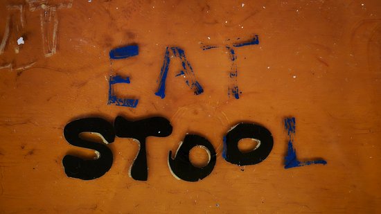 "EAT STOOL" painted on the bar top.  I wondered what this was supposed to mean, because I could definitely go a few different ways on it.