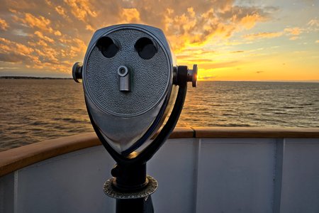 The sunset, with a coin-operated viewer in the foreground.