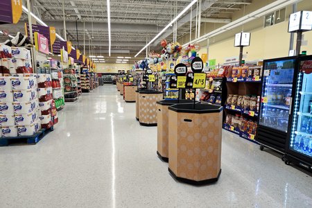 Front aisle, running alongside the checkouts.