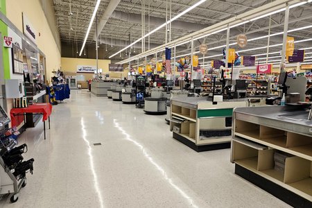 Front aisle on the other side of the checkouts.