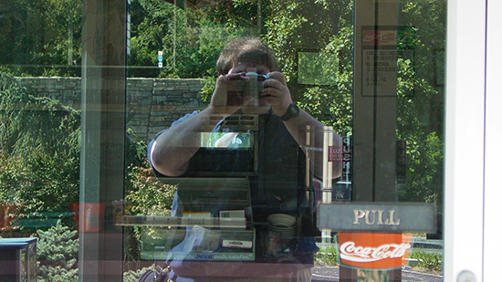 And here's another example of the passage of time.  I don't remember why I shot this.  Clearly, I was aware that I was catching my reflection, but beyond that, I am not sure I had intended this shot as something of a selfie, or as a way of documenting the interior.